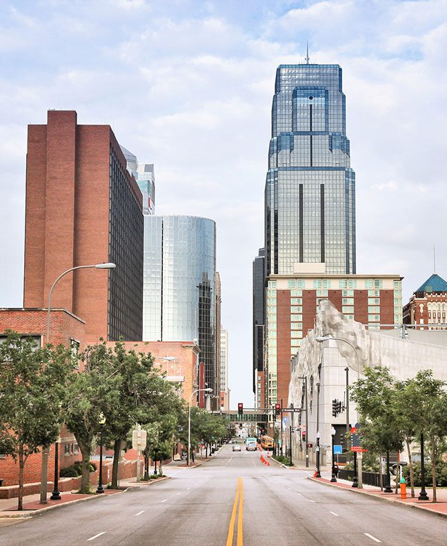 A street lined with skyscrapers near where Key Partners property management offers Kansas City property management